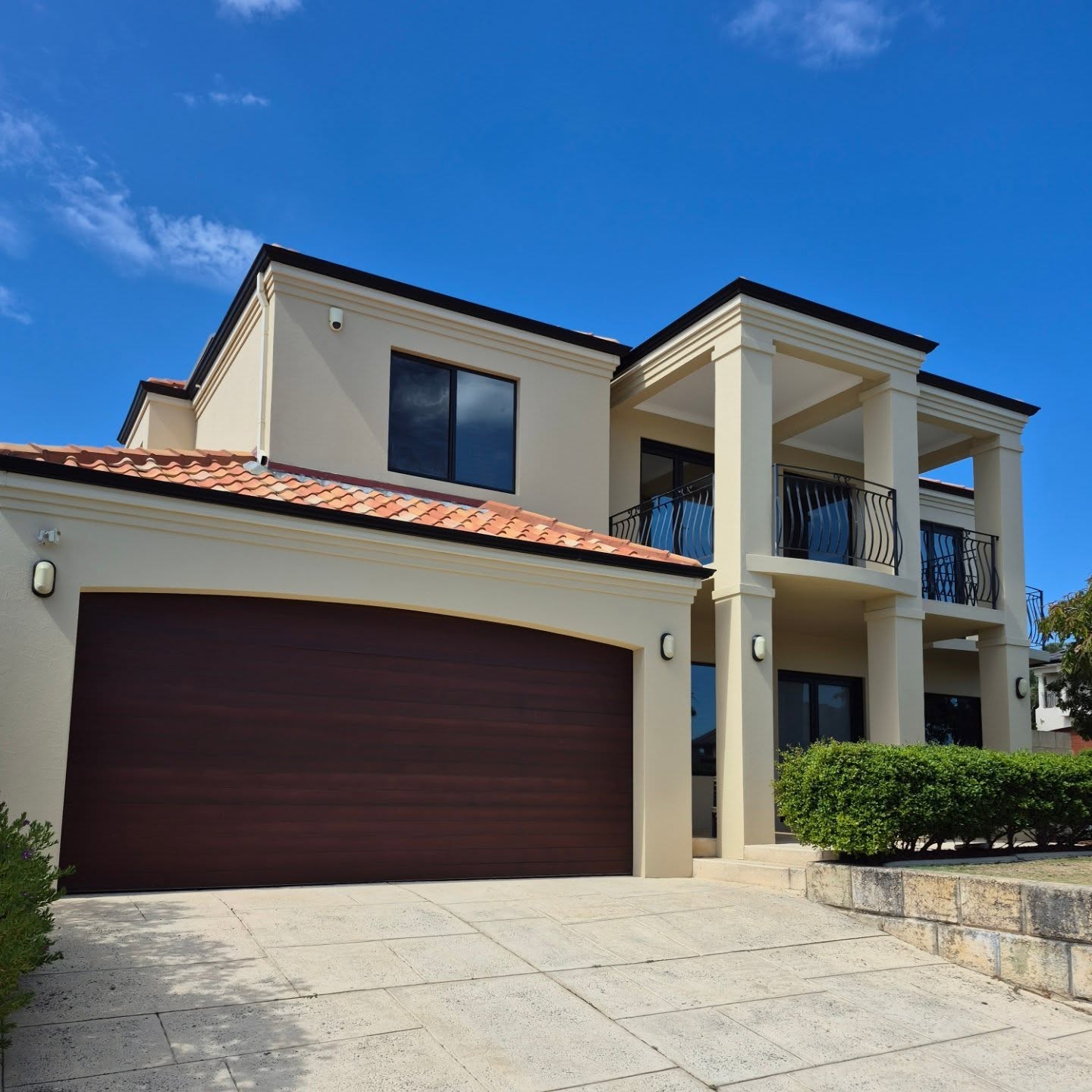 Large two-storey Hillarys home after a complete warm neutral exterior repaint